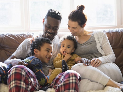 Family relaxing together on a couch